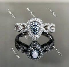 Sassanach pear pave moissanite engagement ring